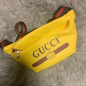 Yellow copy Gucci fanny pack and cross body bag open to offer